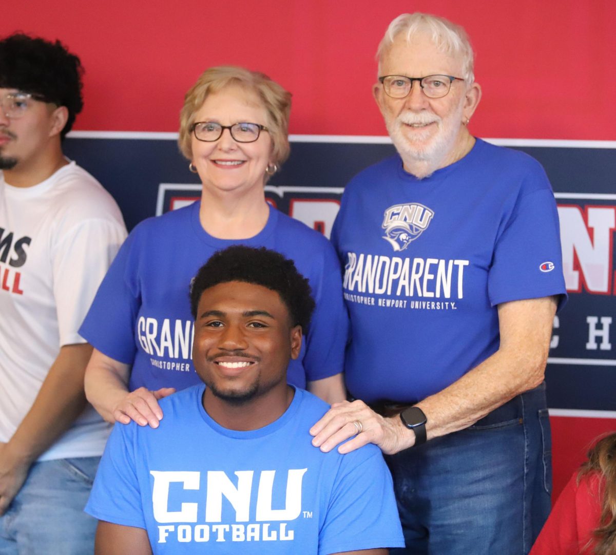 Senior Mason Smith celebrates signing with CNU.