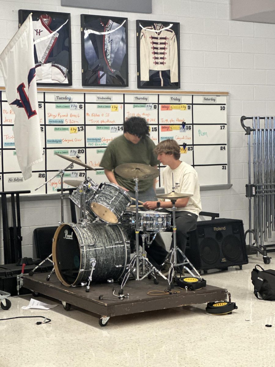 Freshman Oliver Howdyshell and Ben Nguyen practicing drums