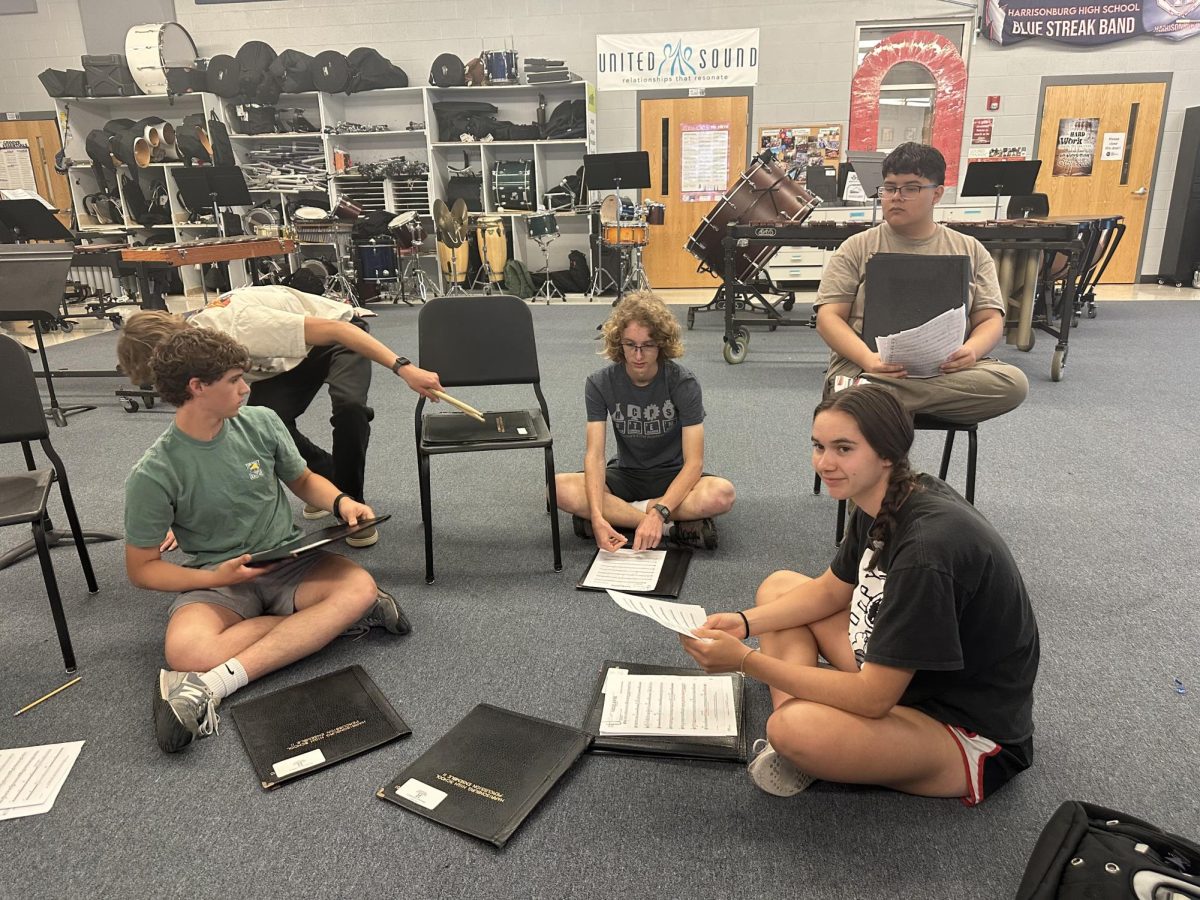 Students composing music together