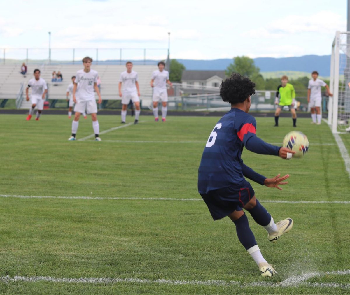 Sophomore Joshua Urbina Jimenez kicking the ball to his teammates.