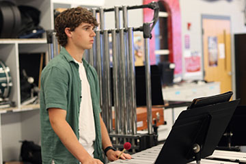 Billy Perritt practicing his instrument.