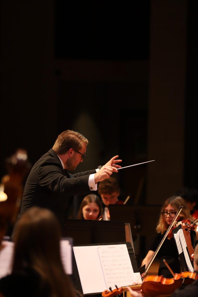 Brian Incheck conducting the Chamber Orchestra. "I really do love my job , seeing my students grow".