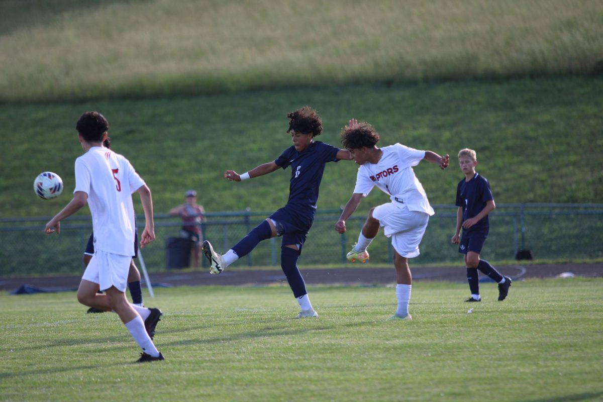 Eighth grader Michael Hernandez kicks the ball.