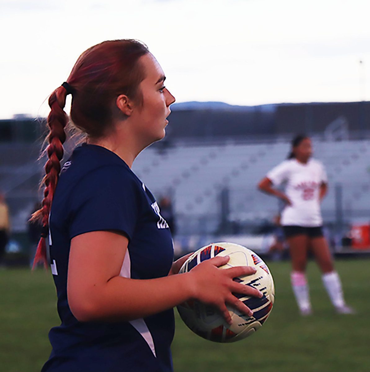 Junior Molly Ludwig preparing to throw the ball