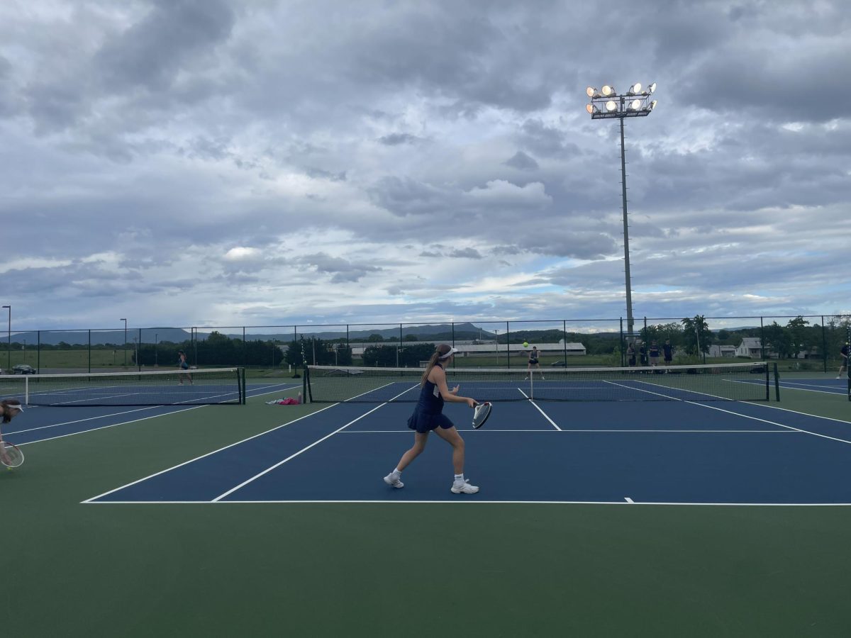 Senior Veronica Gutierrez swings the ball towards victory. 