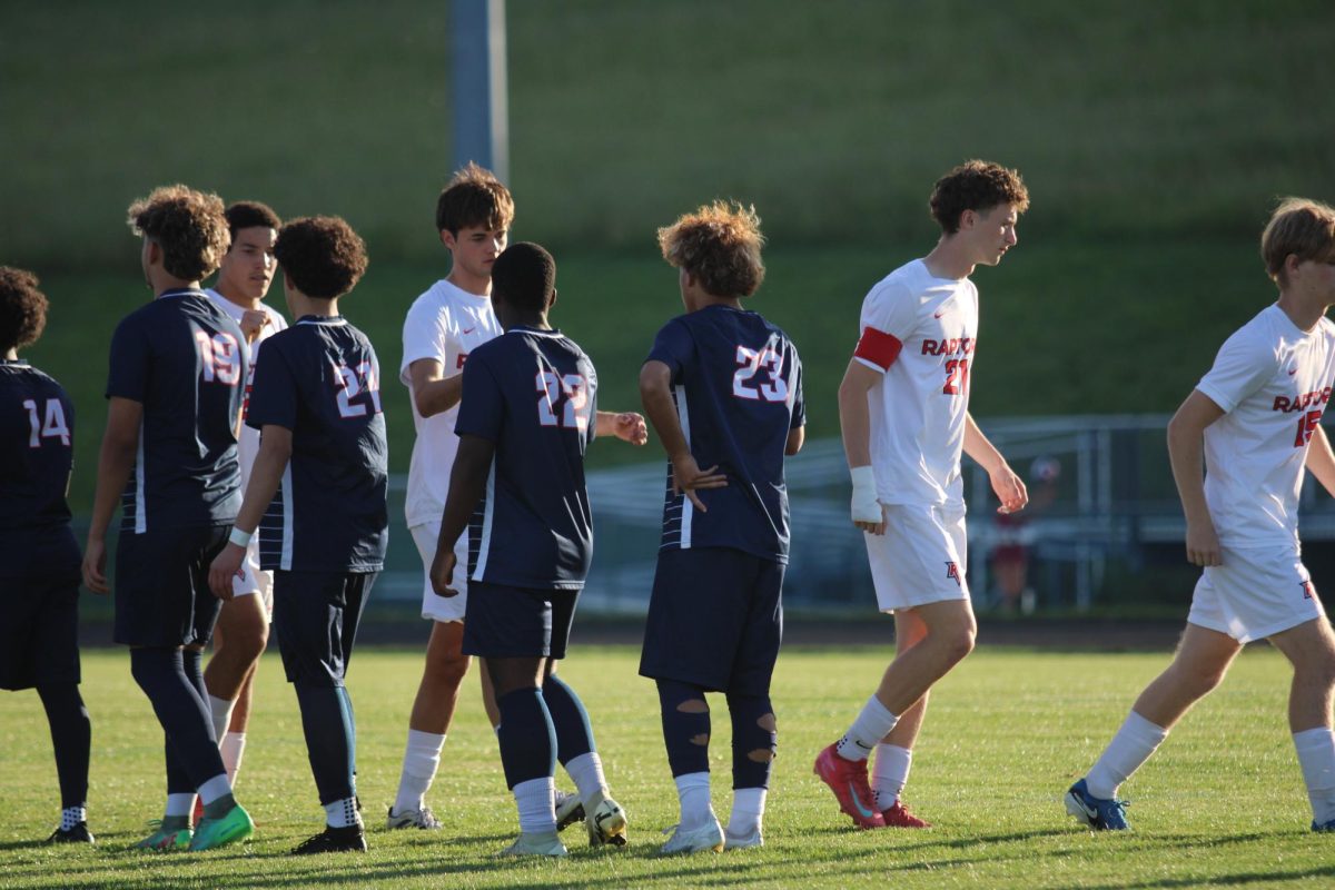 Varsity Blue streaks greeting the Varsity Raptors before the game.