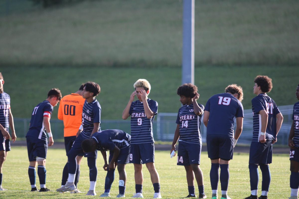 Players waiting for the game to start.