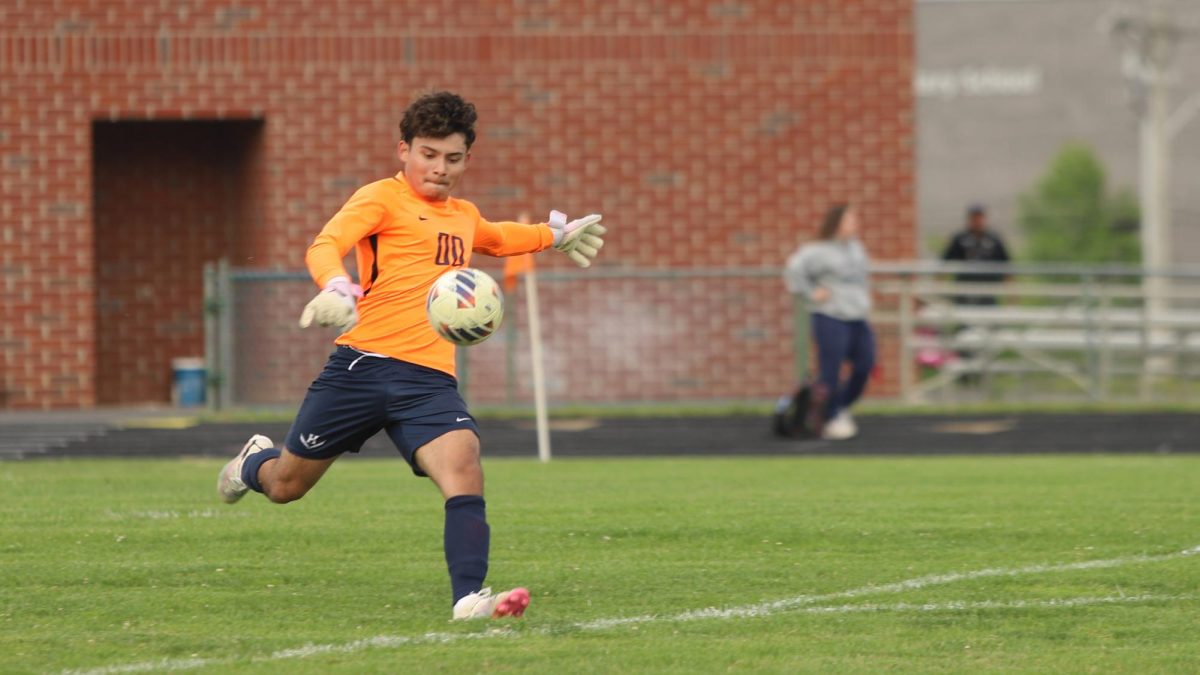 Junior Adolfo Rivera Rivas kicking the ball to his team
