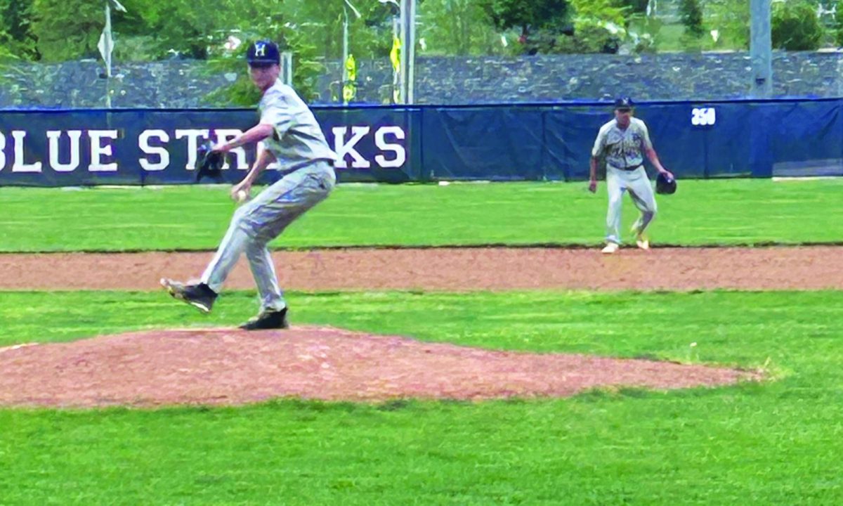 Freshman Abram Wenger throws a strike against the Broadway Gobblers.