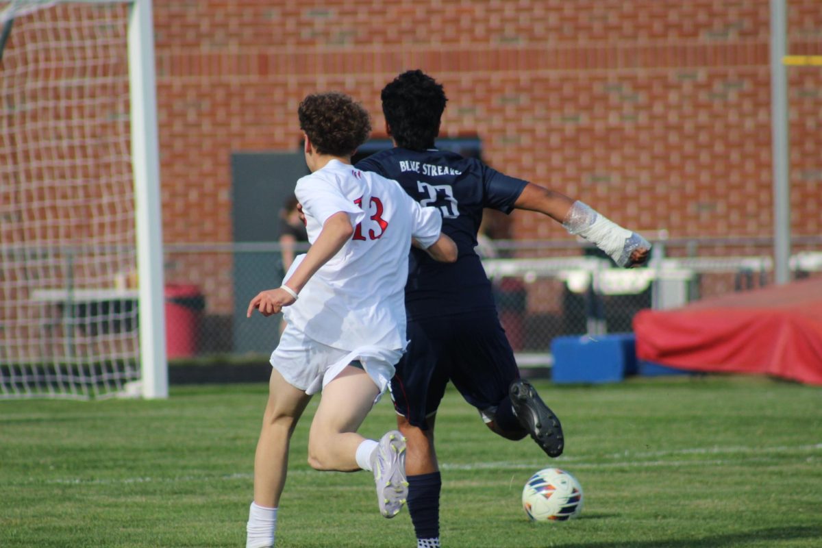 Sophomore Jose Mendoza runs after the ball.