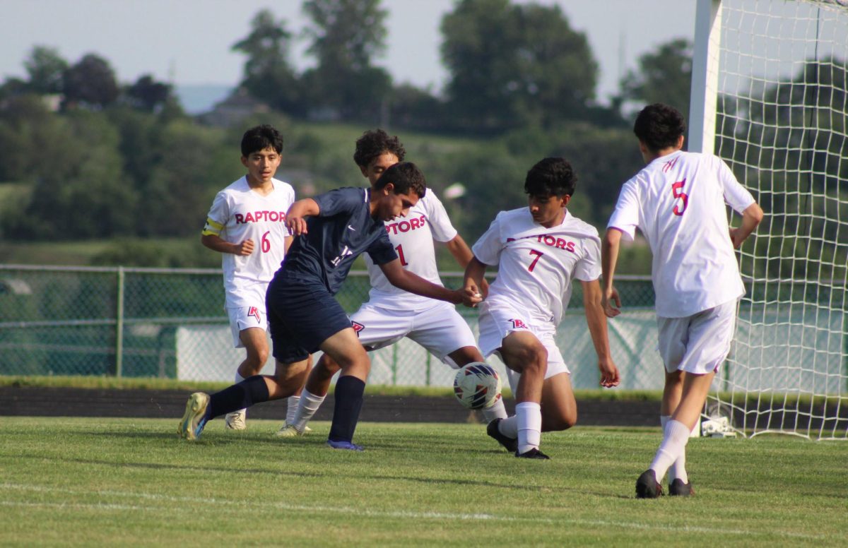Sophomore Zhir Yousif fights hard to maintain the ball.