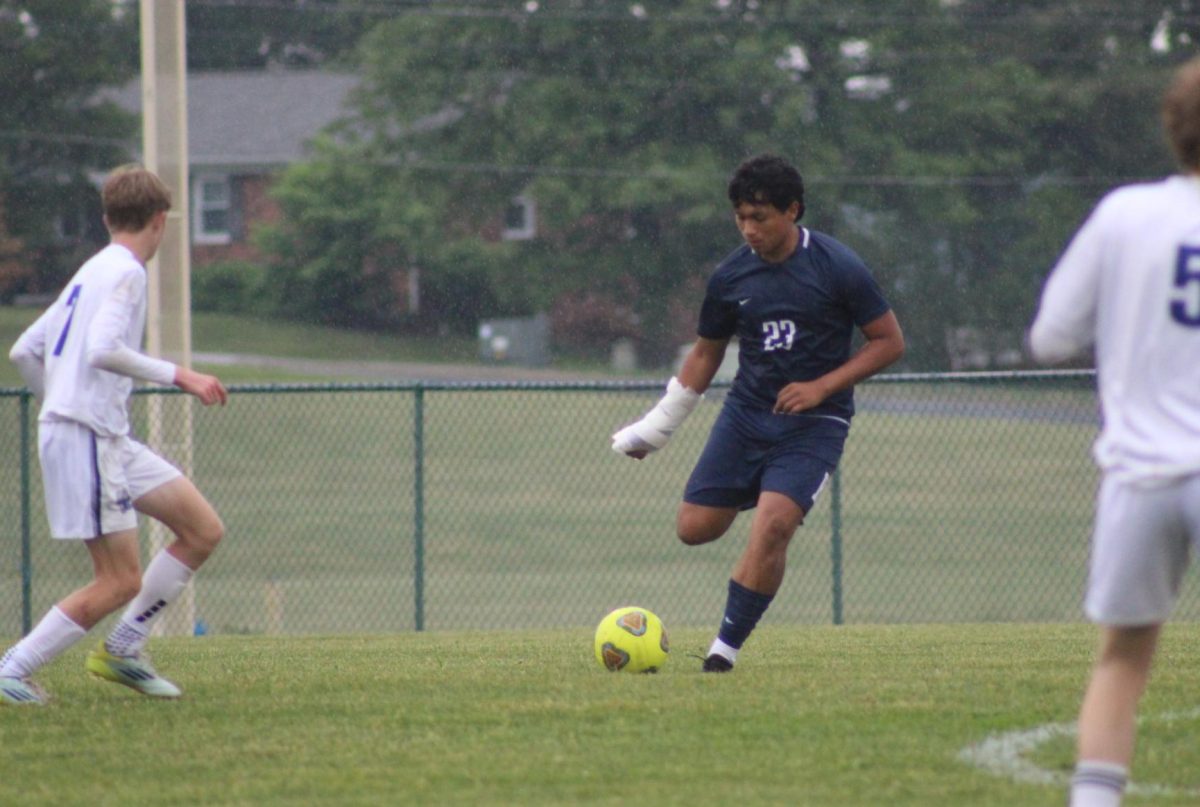 Sophomore Jose Mendoza kicks the ball. 