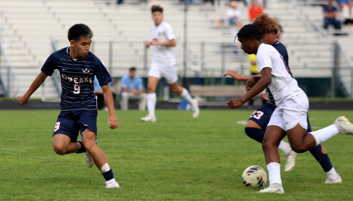 Junior edison rattana waiting to get the ball from his opponents 