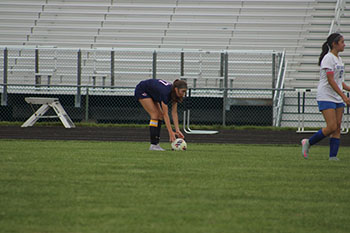 Player #17 is going to start off the game with a strong kick.