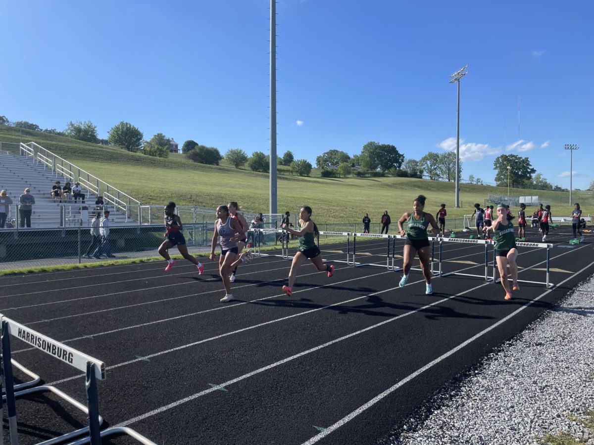 Junior Mariah Etienne runs the 100 meter with ten hurdles. 