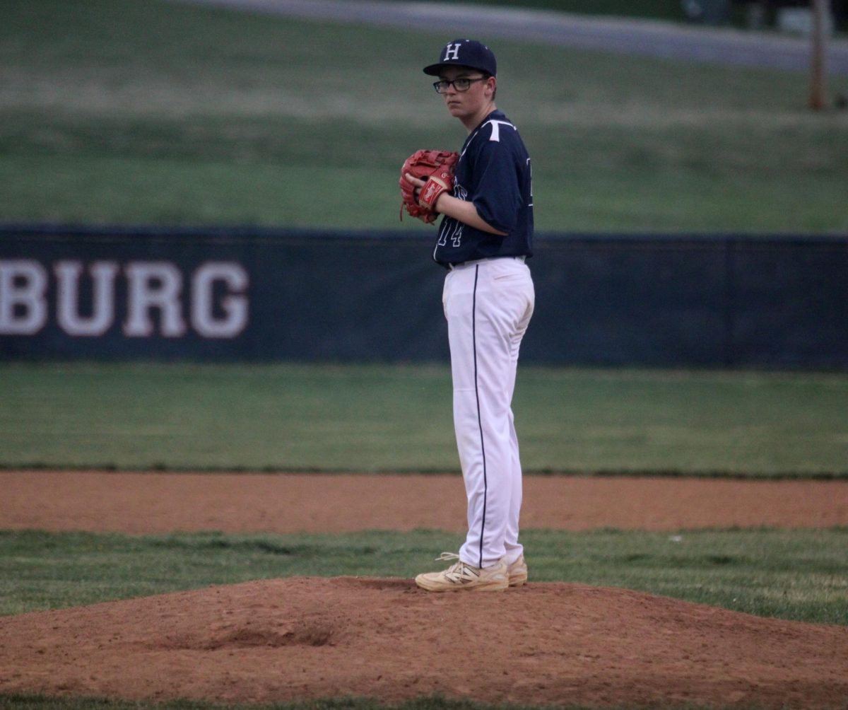 Sophomore Shea Gibson watches the field.