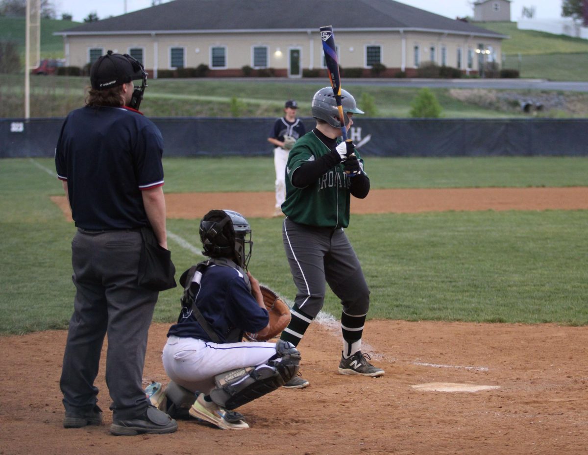 Eighth grader Xavier Perry watches his opponent.