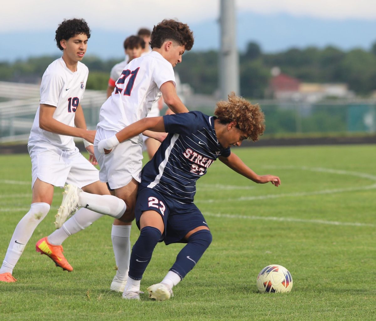 Junior Kaiden Velasquez getting pushed by his opponents 