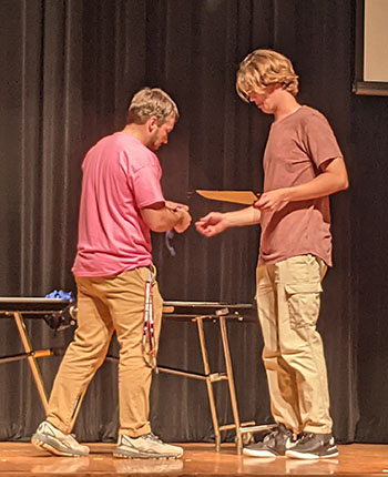 Senior Andrew Lankford goes up on stage to accept his award.