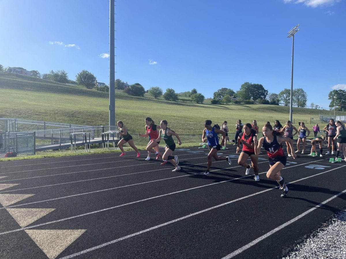 Junior Liva Jwanmery runs the 100 meter. 