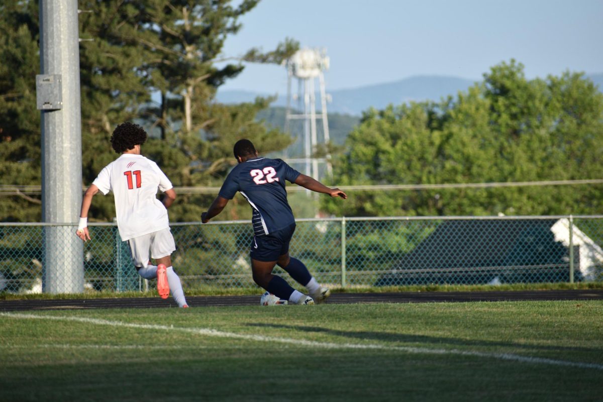 Junior Eritier Eca defends the ball.