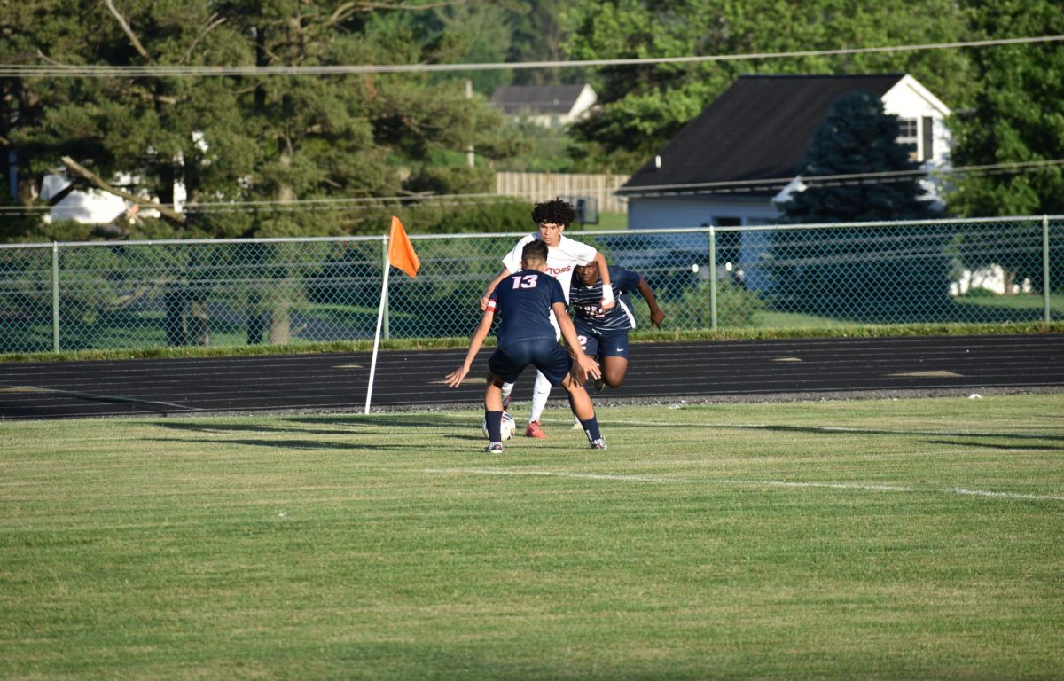 Senior Rayyan Garout on defence.