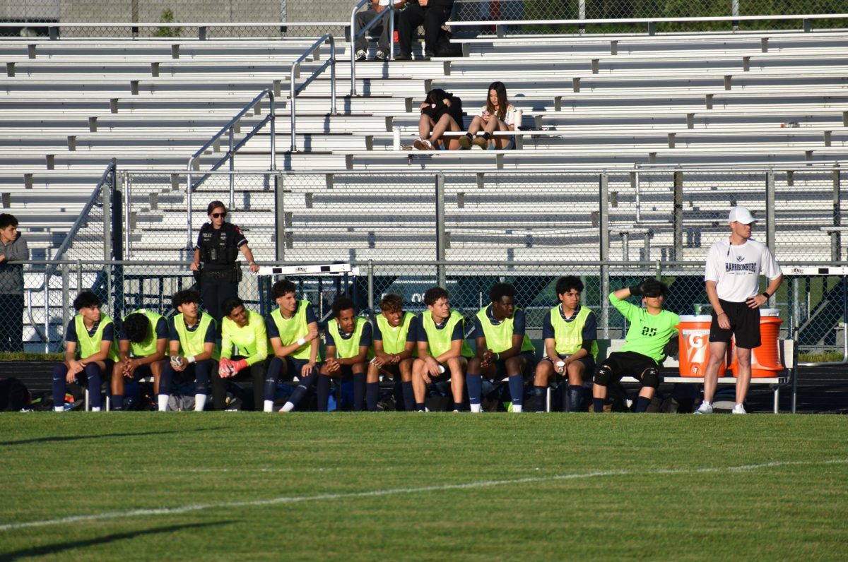 Bench players intently watching the game.
