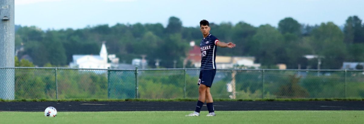Senior Miguel Osorto Osorto pointing where he wants to hit the ball.