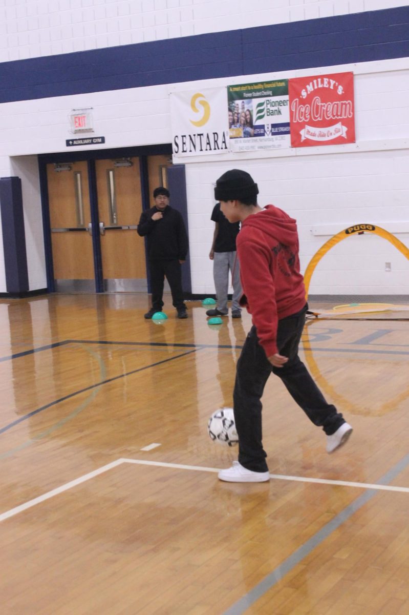 Jose Garcia Machado dribbles the soccer ball between his feet getting ready to score a goal. 