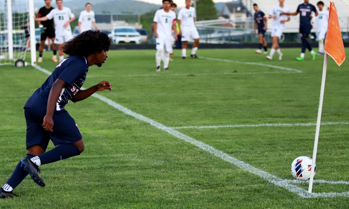 Senior Temesgen Habtemichael about to kick the ball to his team.
