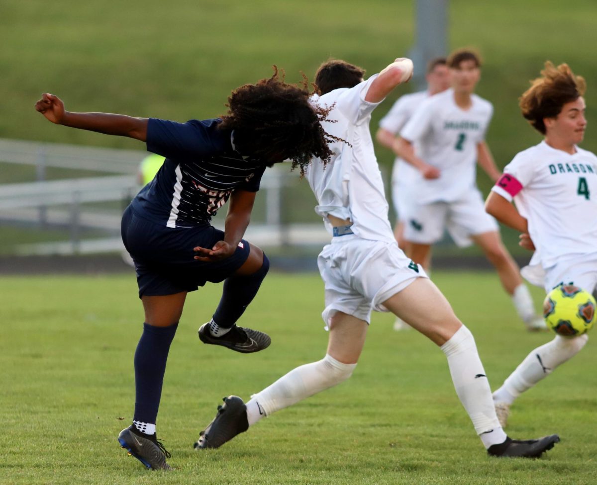Senior Temesgen Habtemichael falling after kicking the ball.