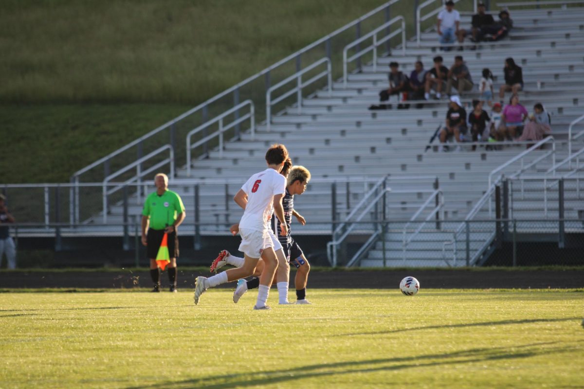 Junior Edison Rattana attempting to defend the ball.