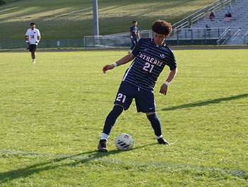 HHS player Juan Chirinos has control of the ball.