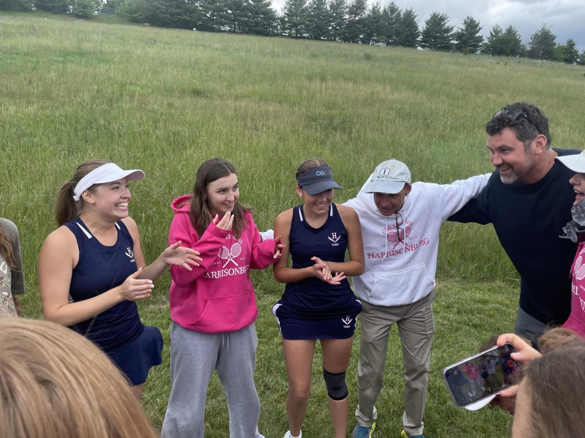 Athletes chant something to show their determination with their coach.