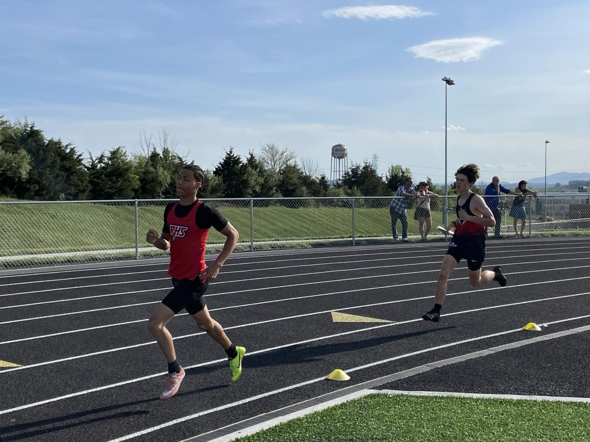 Athletes run the four by eight. 