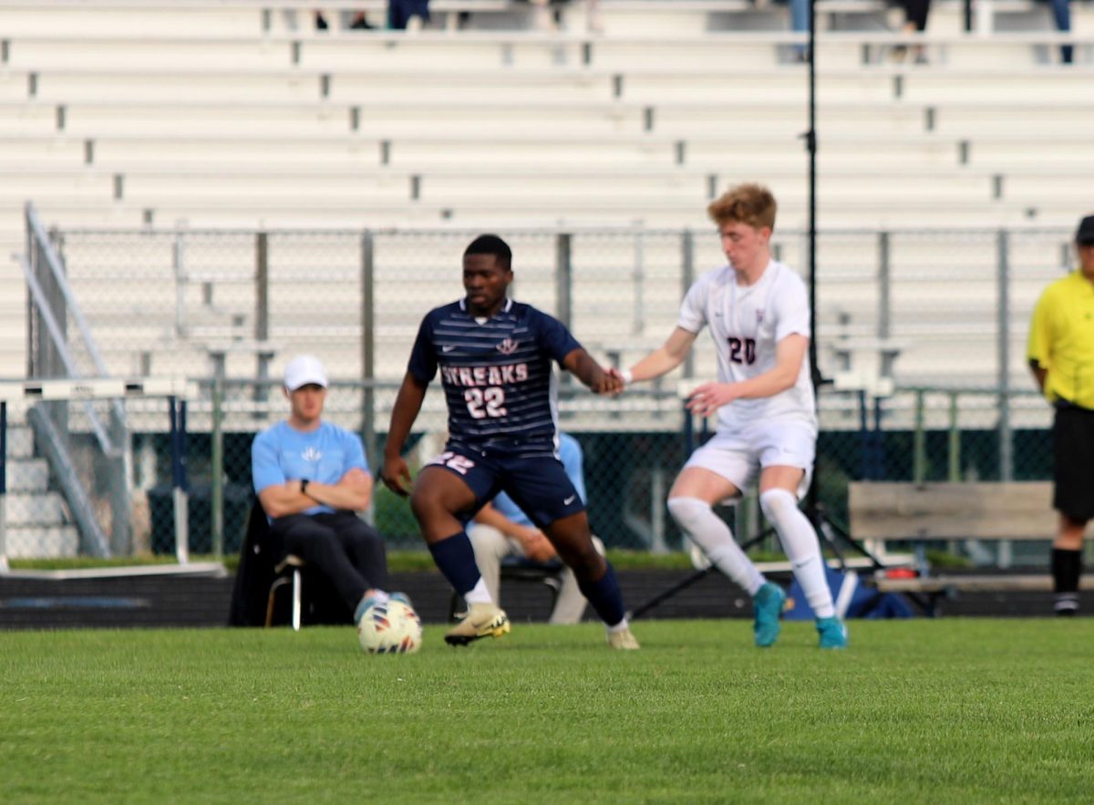Junior Eritier Eca kicking the ball