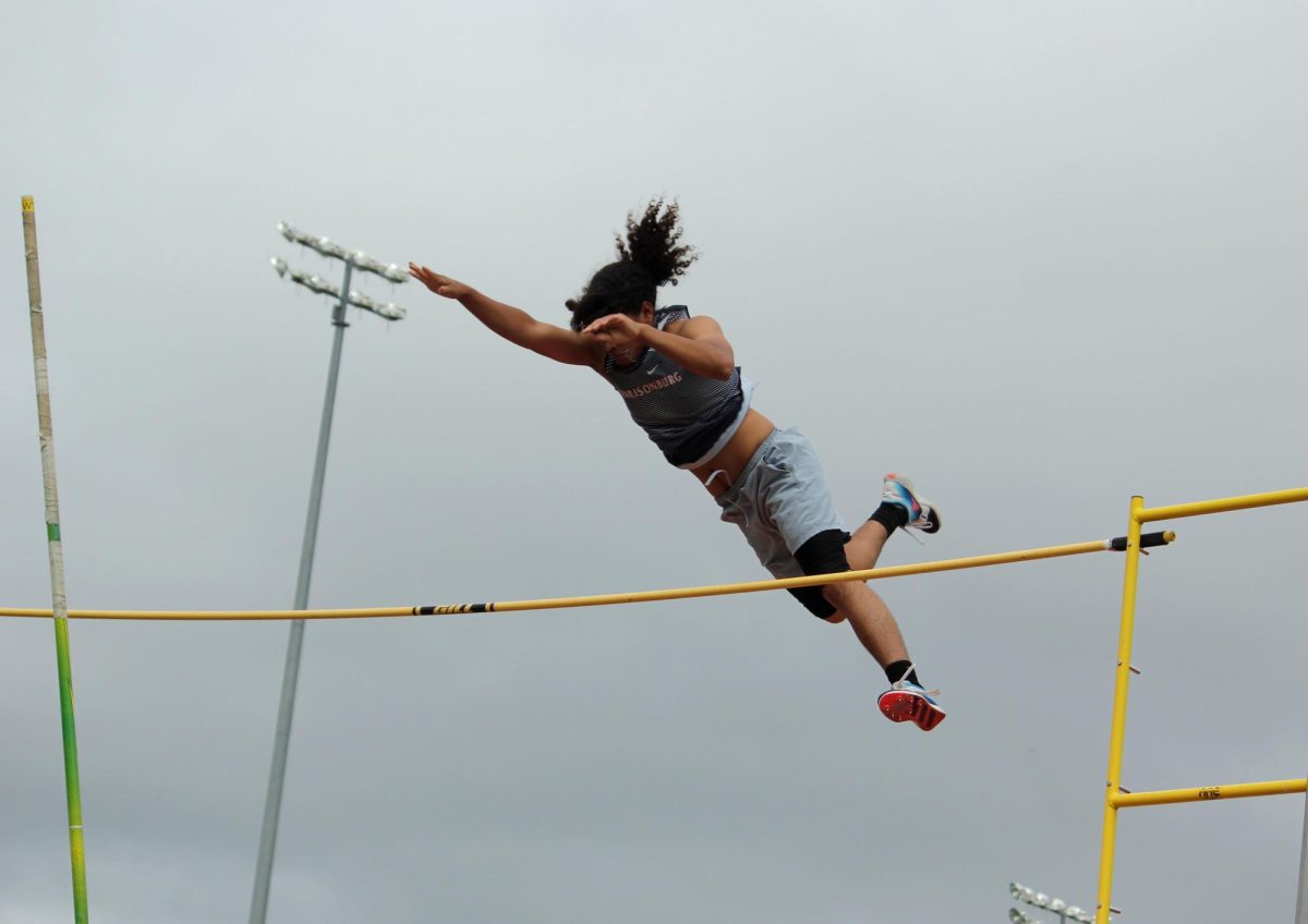Dominic Rodriguez moving his hands up to avoid the bar.
