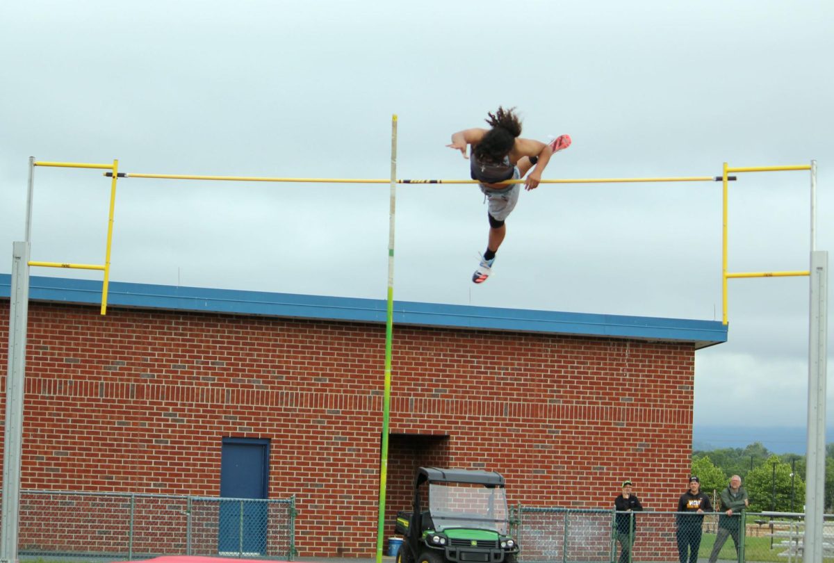 Dominic Rodriguez finishing his vault.