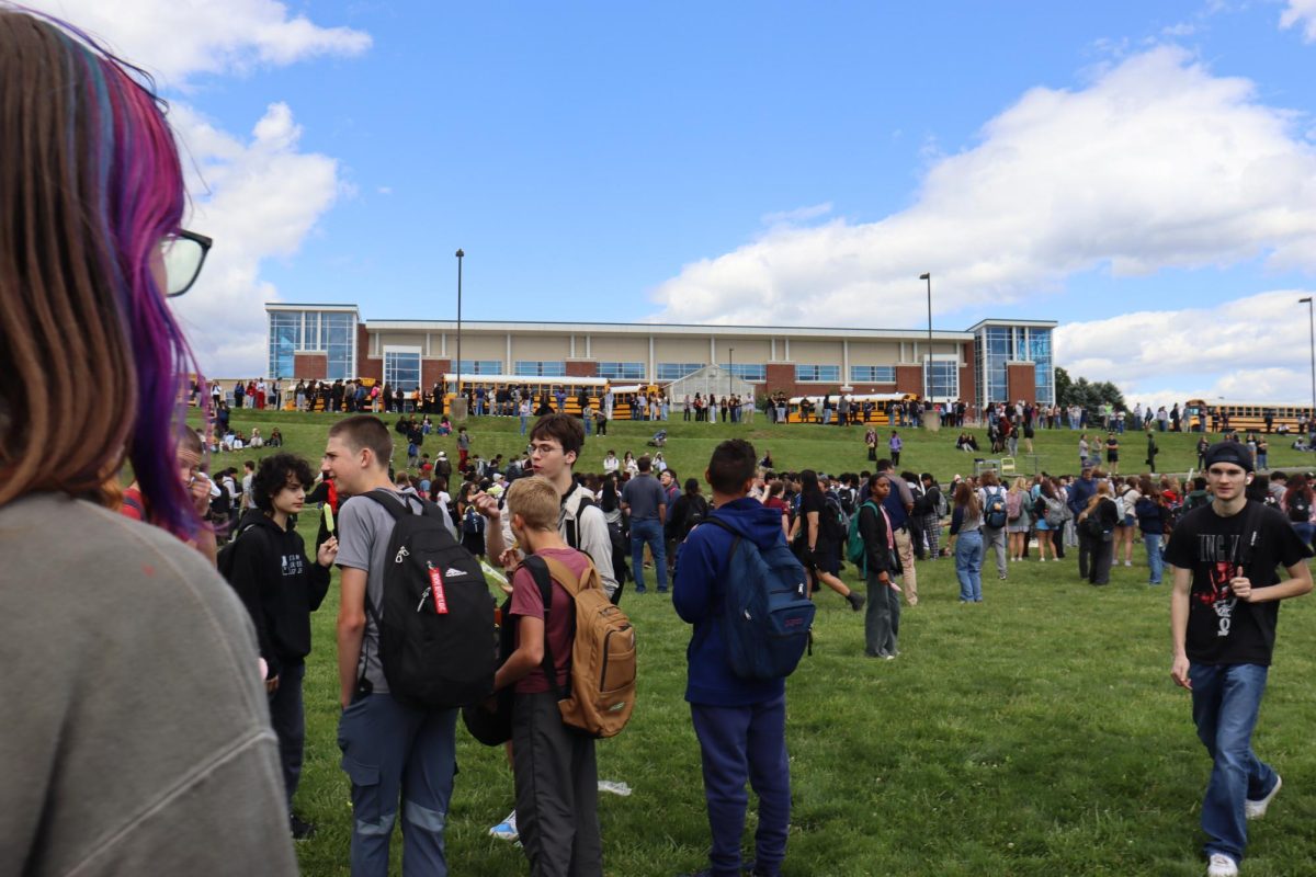 Students talk with each other as the school day slowly ends.