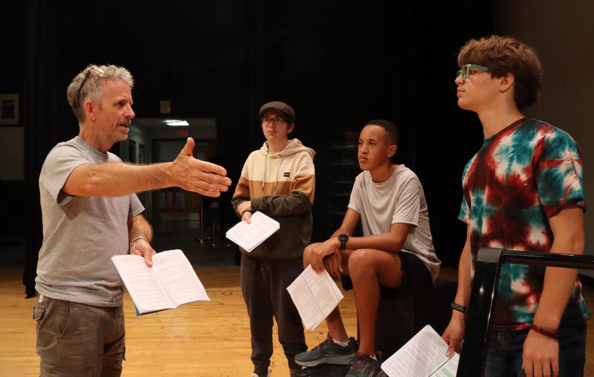 Director Ken Gibson couches actors on how to make an emotional scene.
