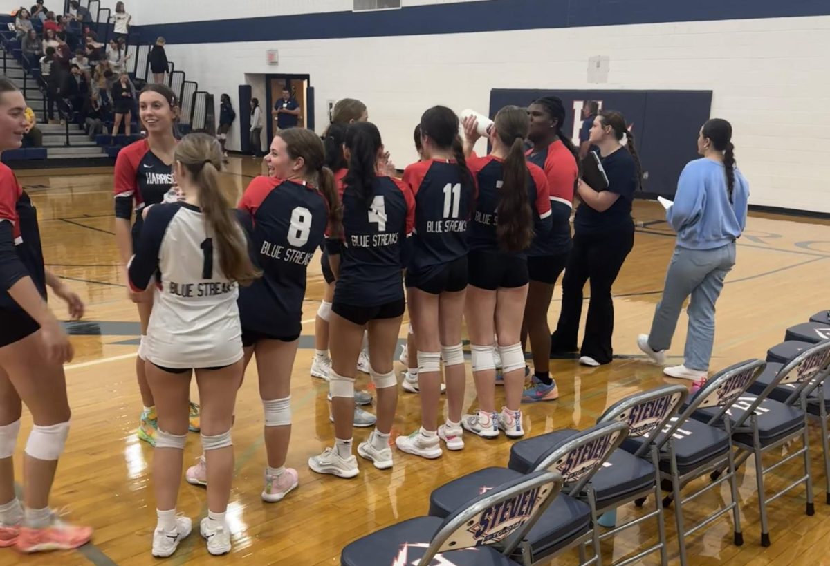 The team celebrates their 3-1 win over the Turner Ashby Knights on Thursday.
