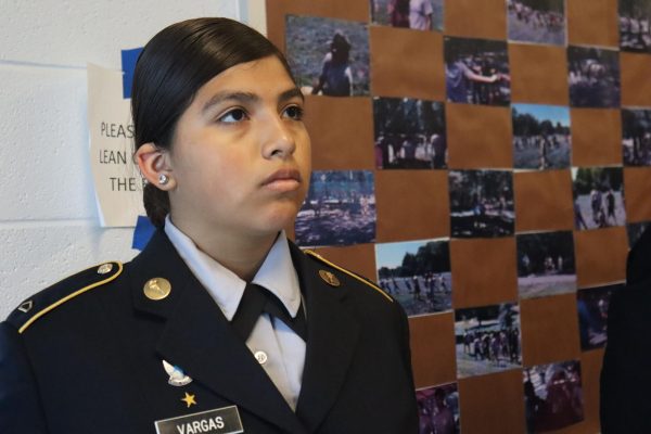 Freshman Hethzel Vargas waiting to be inspected. "I felt nervous because I have never been inspected before." said Vargas.