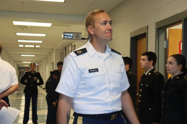 SFC Enderle smiling happily at his students during inspections.