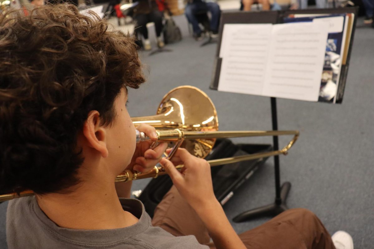 Freshman Julian Nussbaum practicing his trombone.