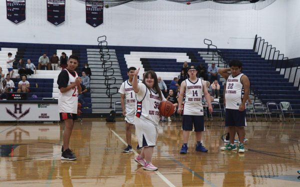 A player on the HHS team giving a thumbs up