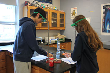 These students are getting their analysis ready to start the experiment.