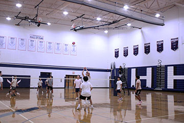 Seniors and Freshman playing against each other the Freshmans are catching up.
