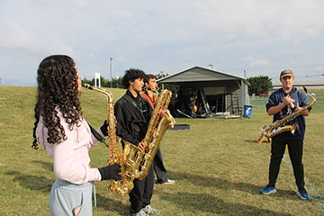 The saxophone section making sure their on beat.