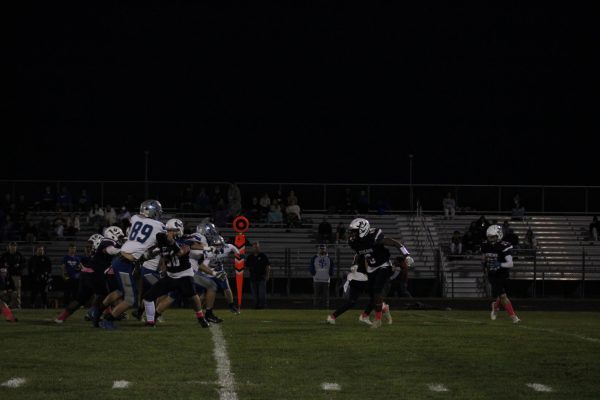 Senior Jerone Crawford rushes the ball up the field.