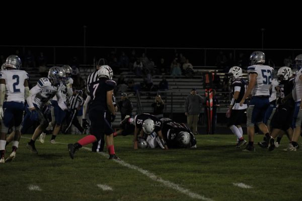 2 Harrisonburg players Mateo Kurtz and Reuben Miller stop the ball against the Blazers of Spotswood.